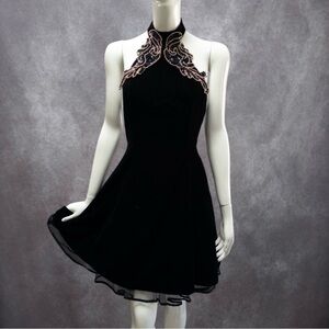 Vintage 90’s black velvet fit and flare halter dress